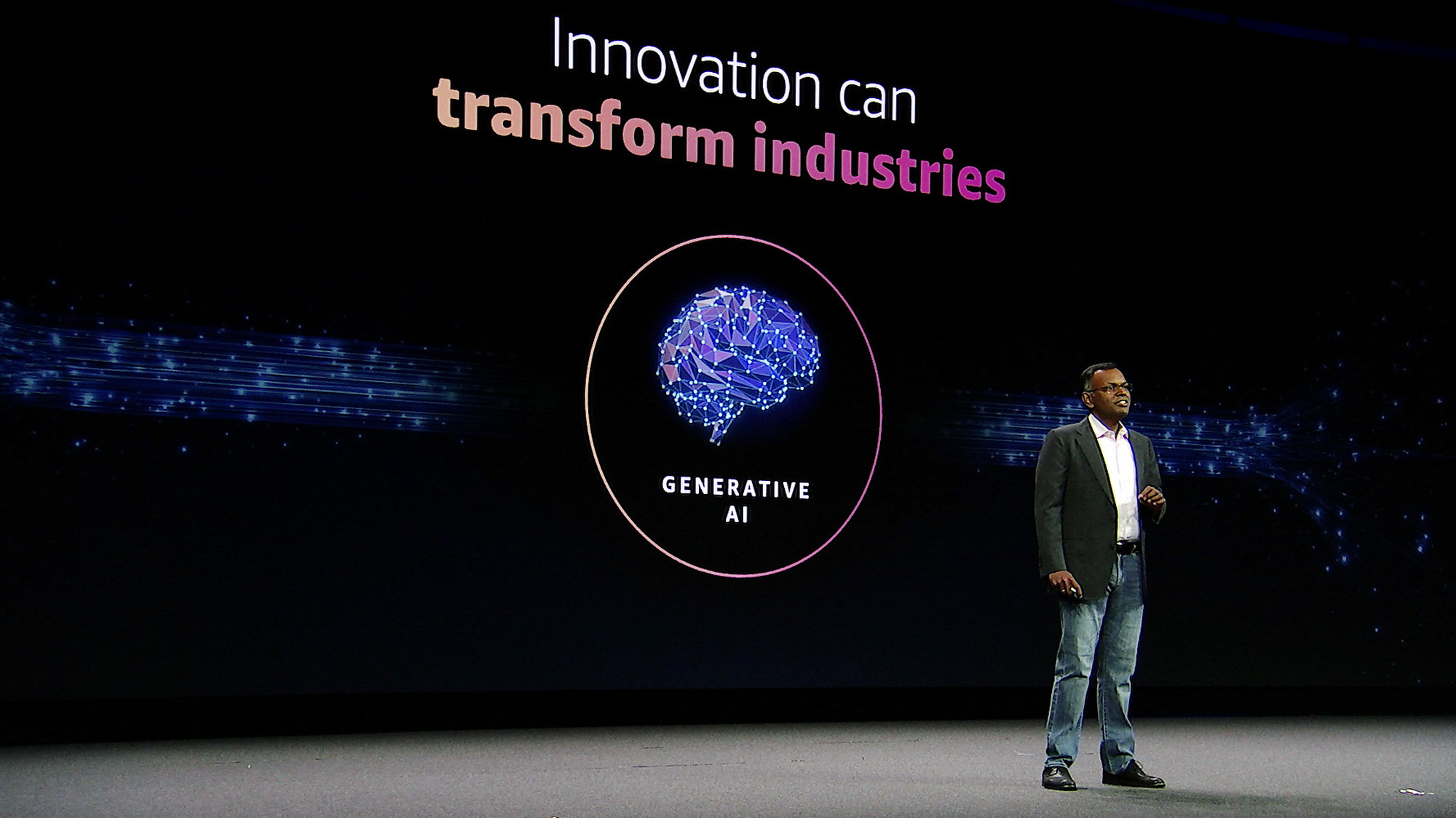 A photo of VP Swami Sivasubramanian speaking on stage at the AWS Summit New York.