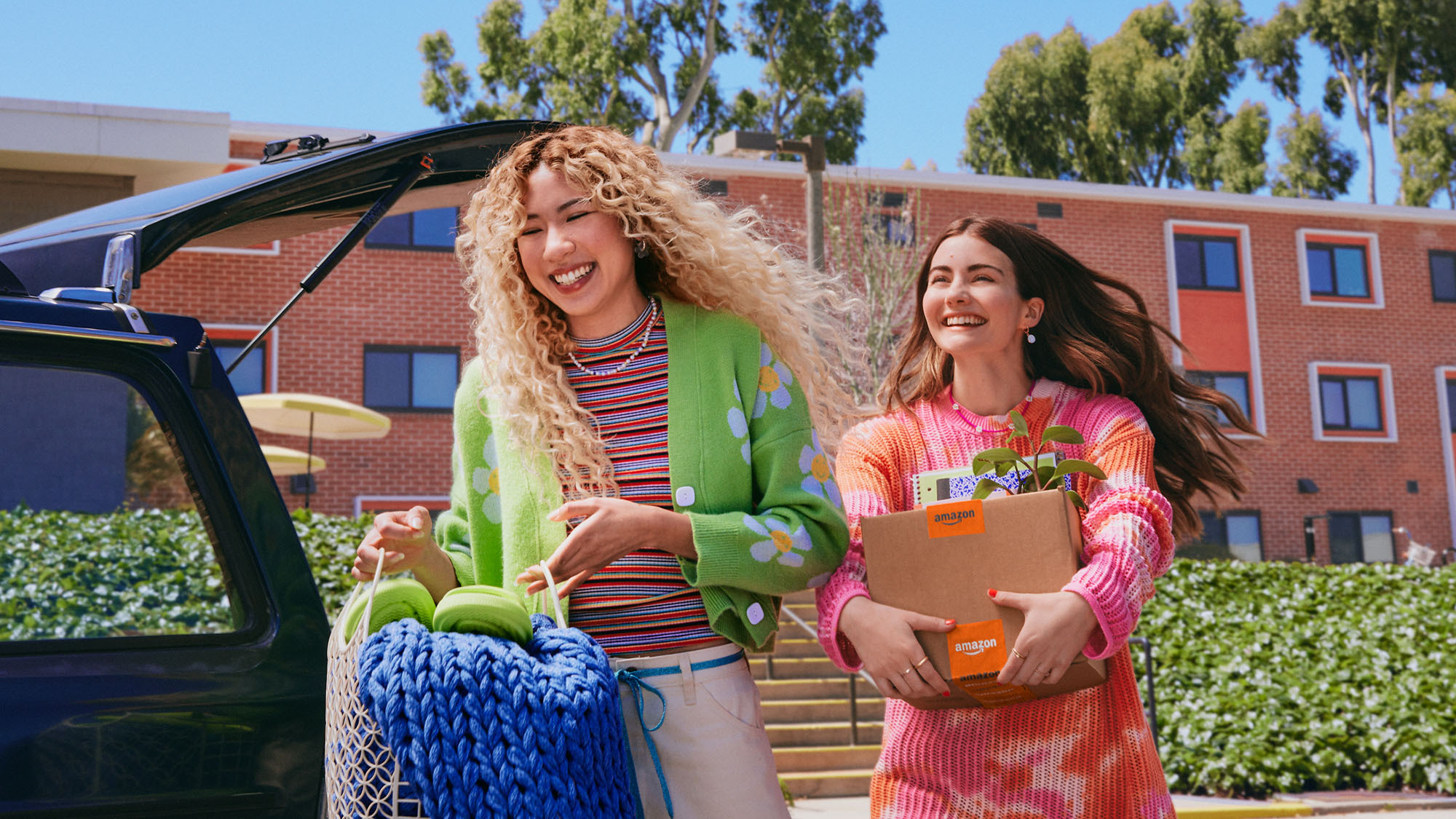 Colorfully dressed friends arriving on campus with deliveries and purchases