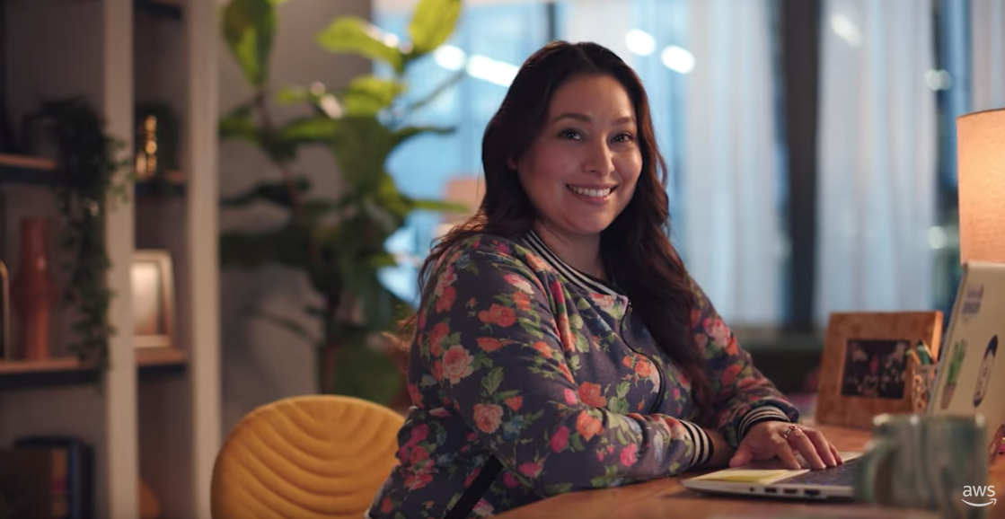An image of a woman working at AWS