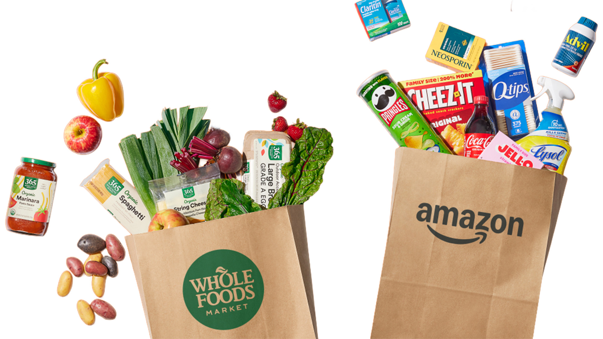 Grocery bags from Whole Foods and Amazon filled with fresh produce and packaged goods
