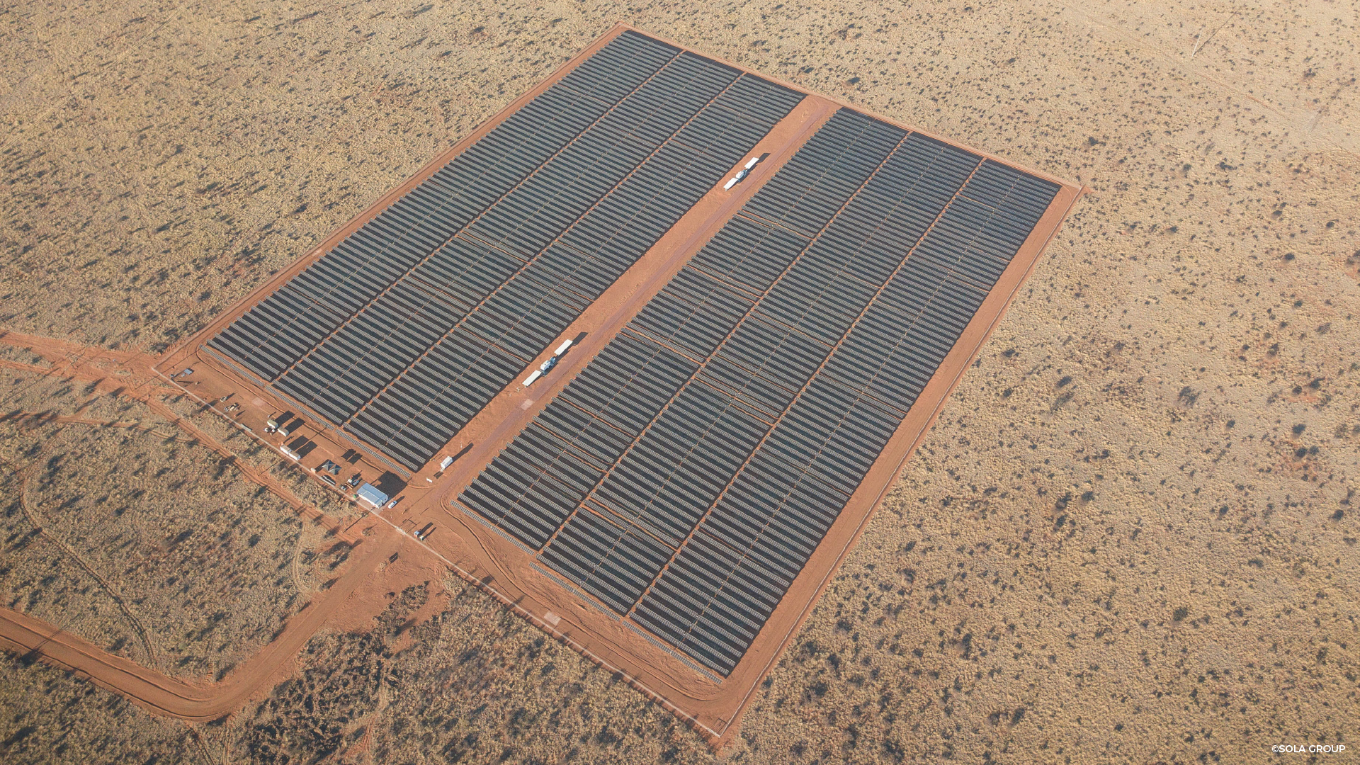 An aerial image of the solar project that has 6 columns of solar panels.