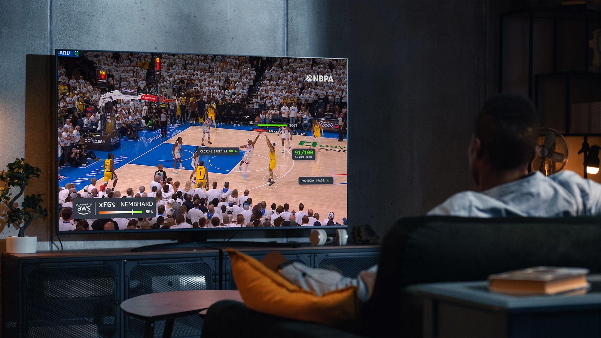 NBA game on TV in dimly lit living room

