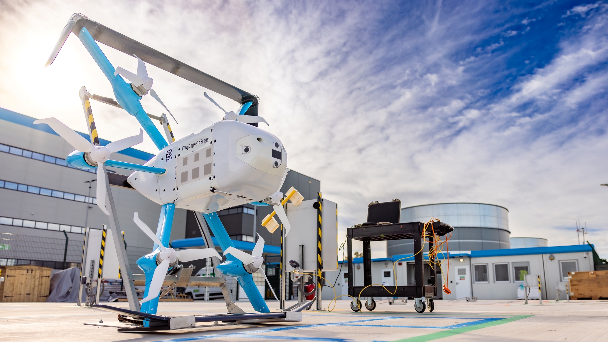 Large white and blue drone with multiple rotors