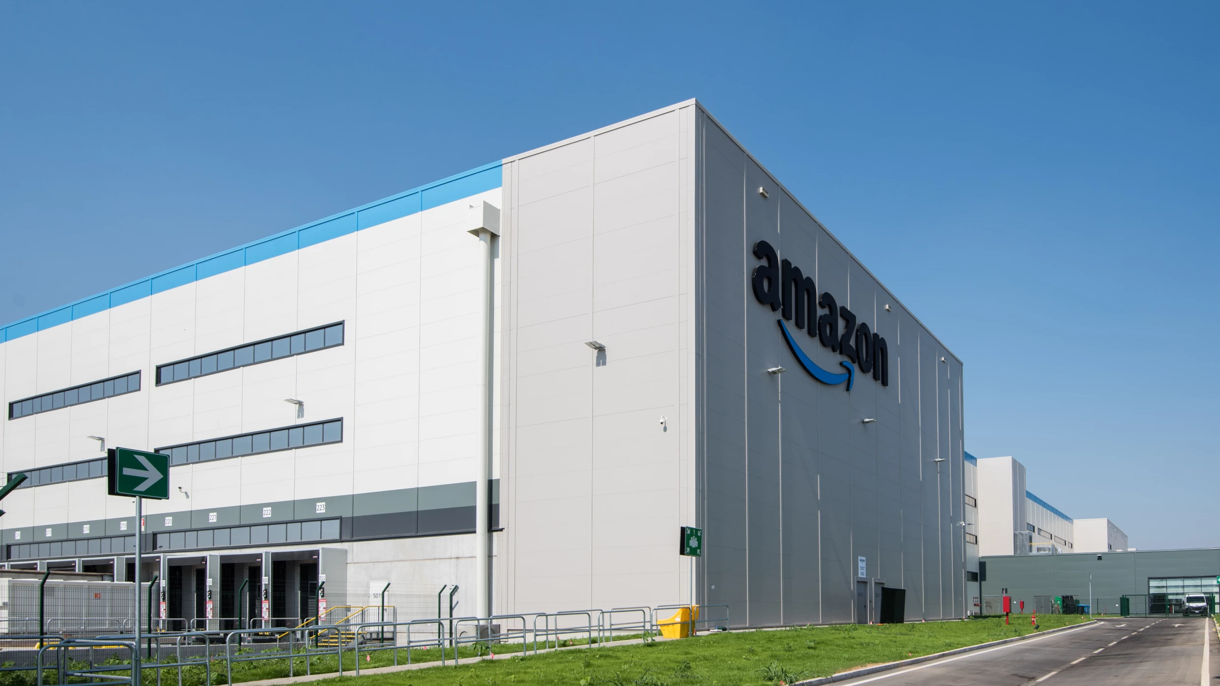 About Amazon Italy fulfillment centre on a clear sunny day