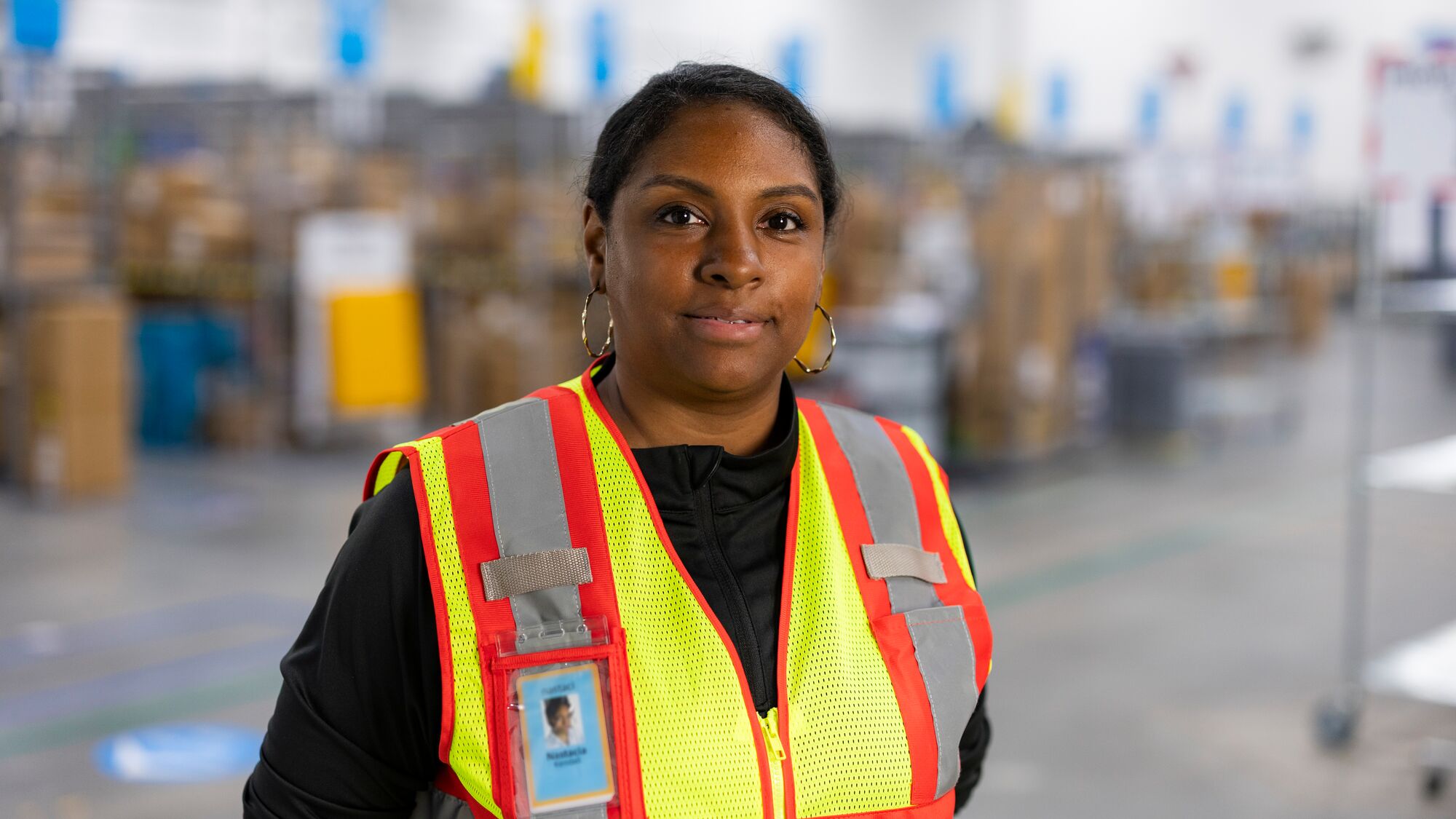 Smiling staff member in warehouse