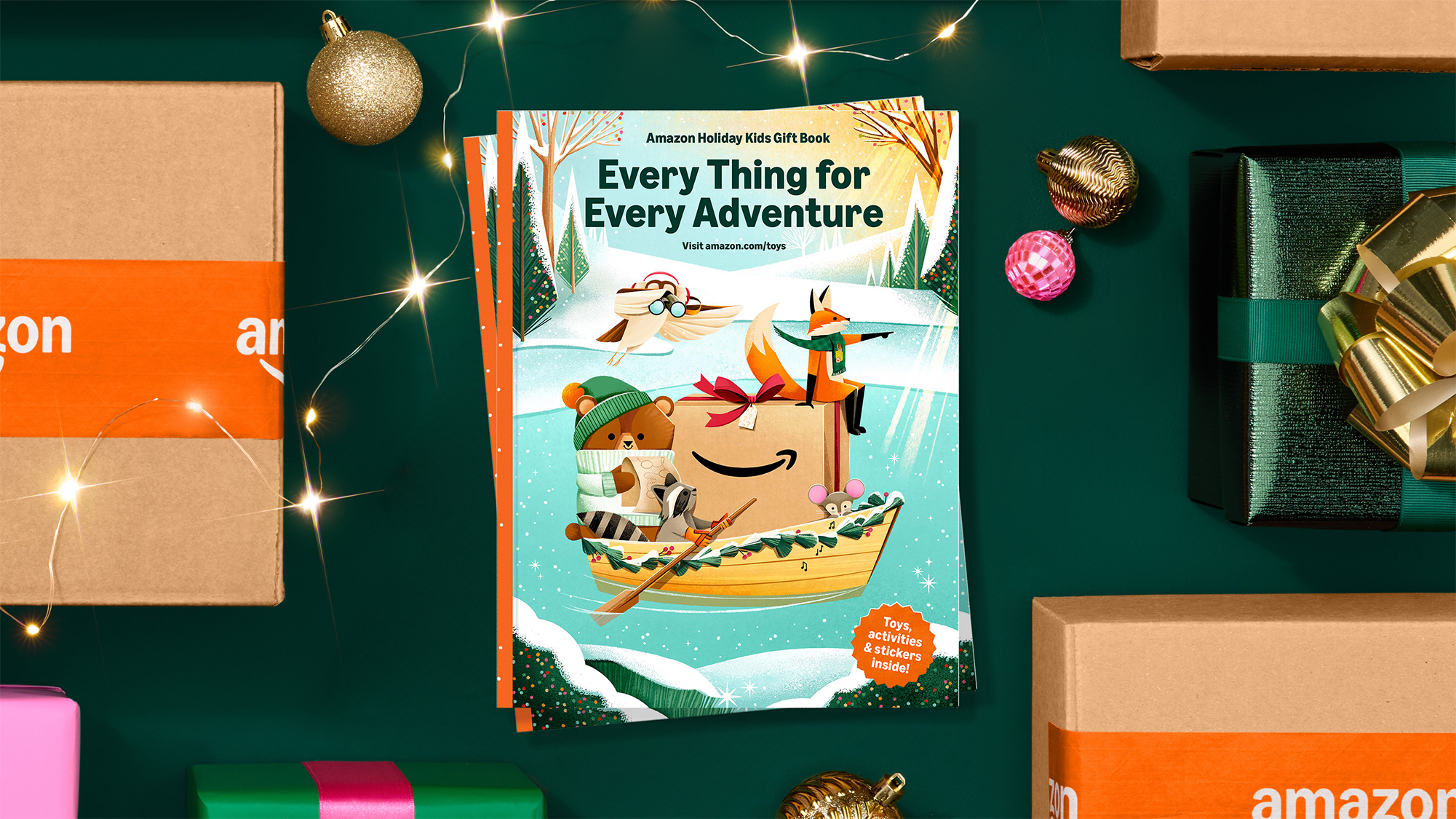 Amazon Holiday Kids Gift Book surrounded by packages and ornaments
