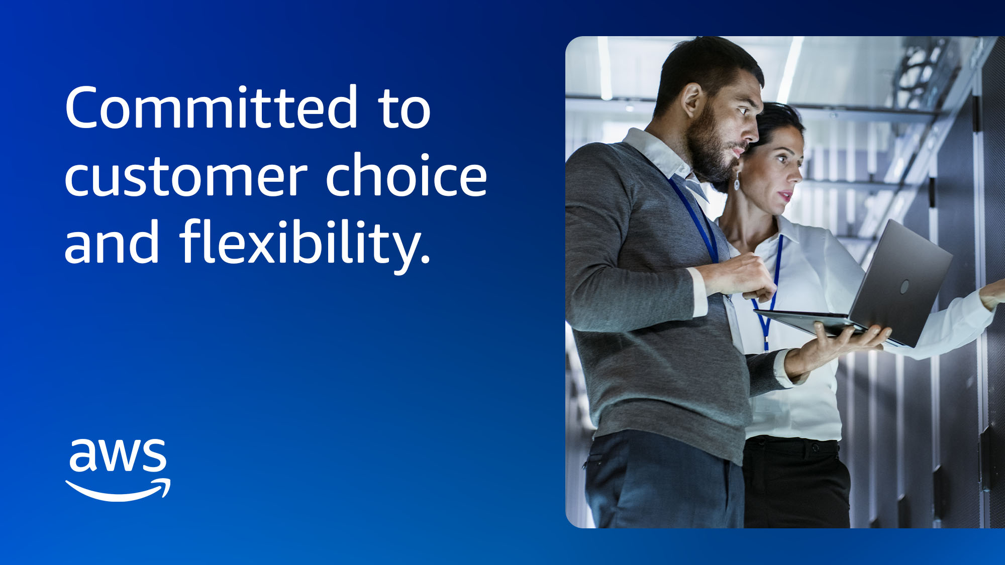 AWS logo and line, "Committed to customer choice and flexibility." Also included is a photo of two people working on a laptop device.