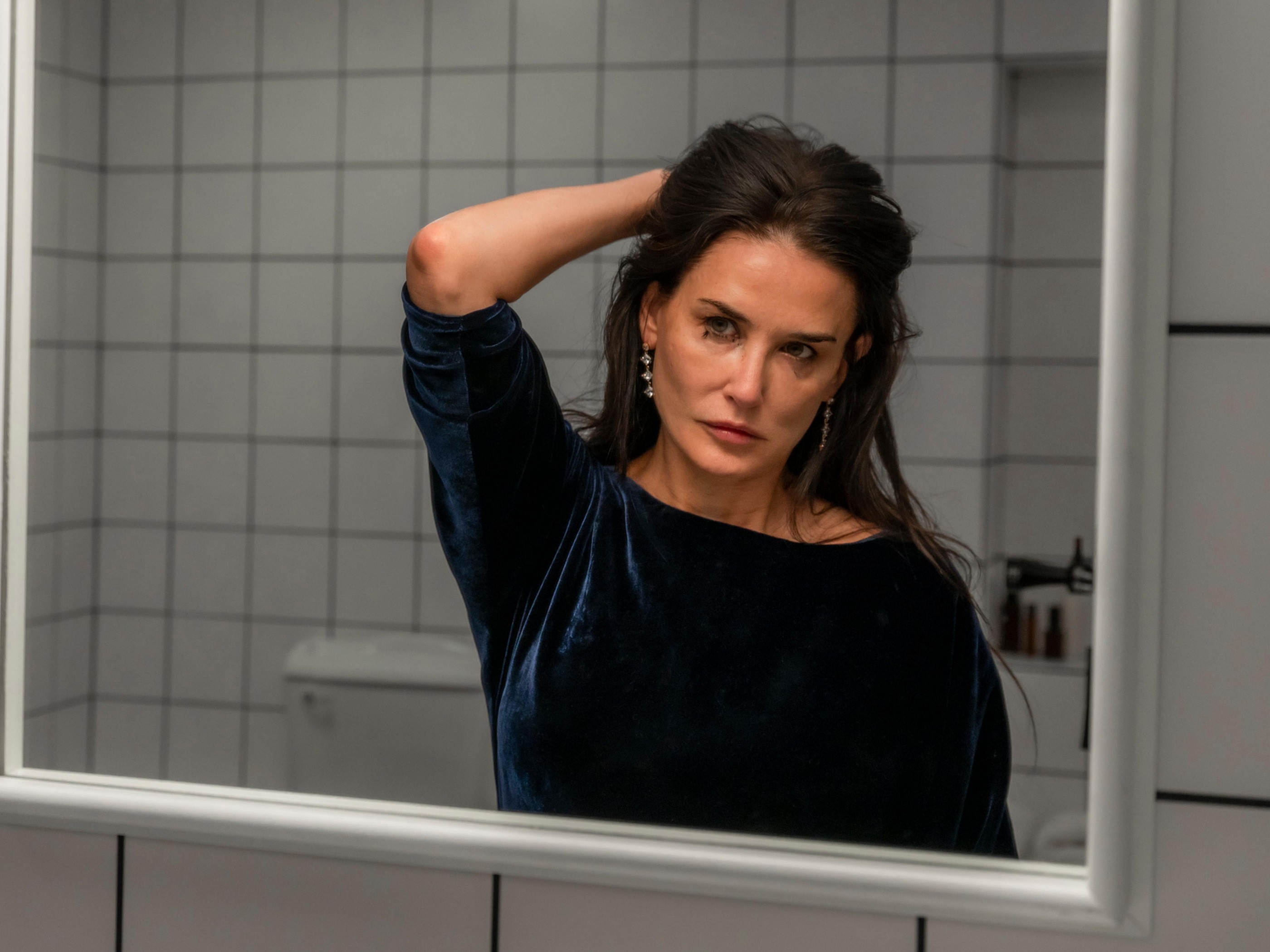 A still from The Substance, starring Demi Moore