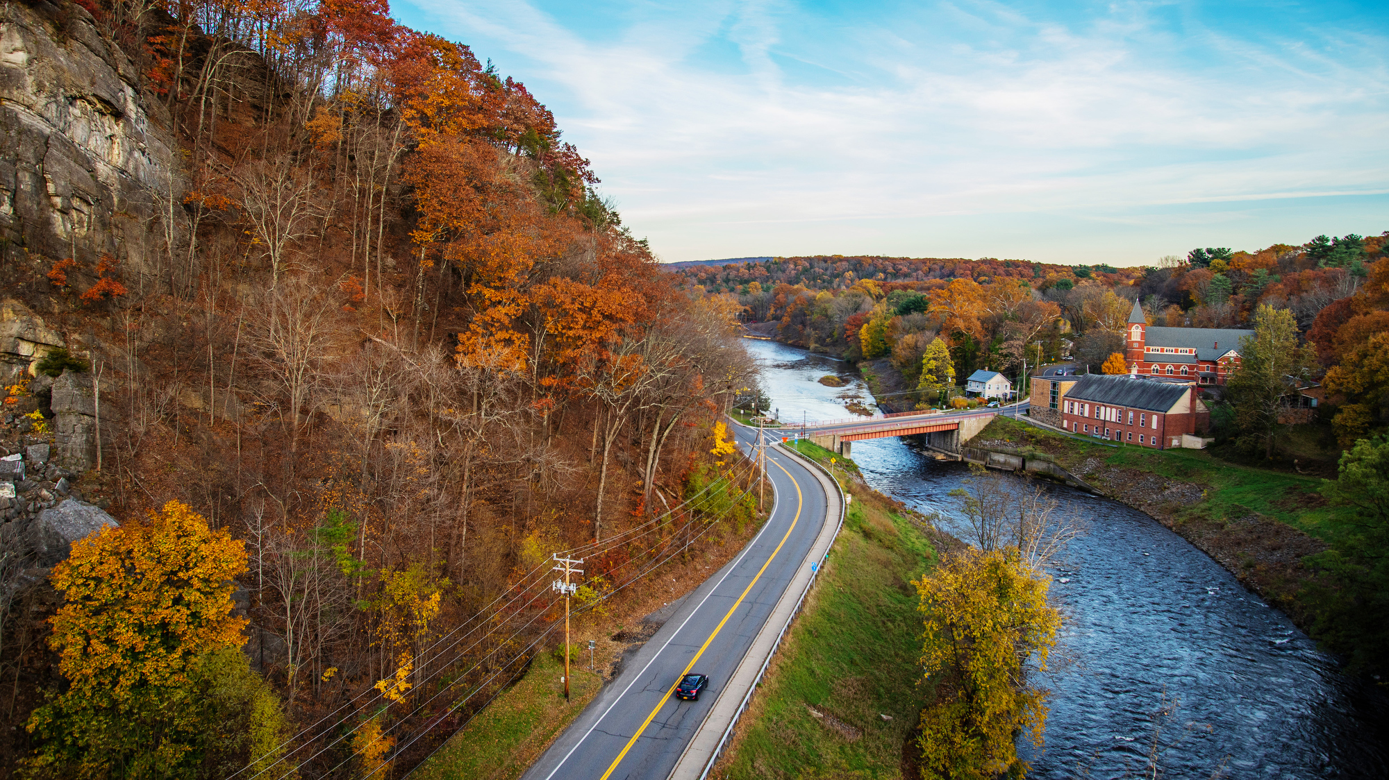 view of rural New York state with the changing fall trees