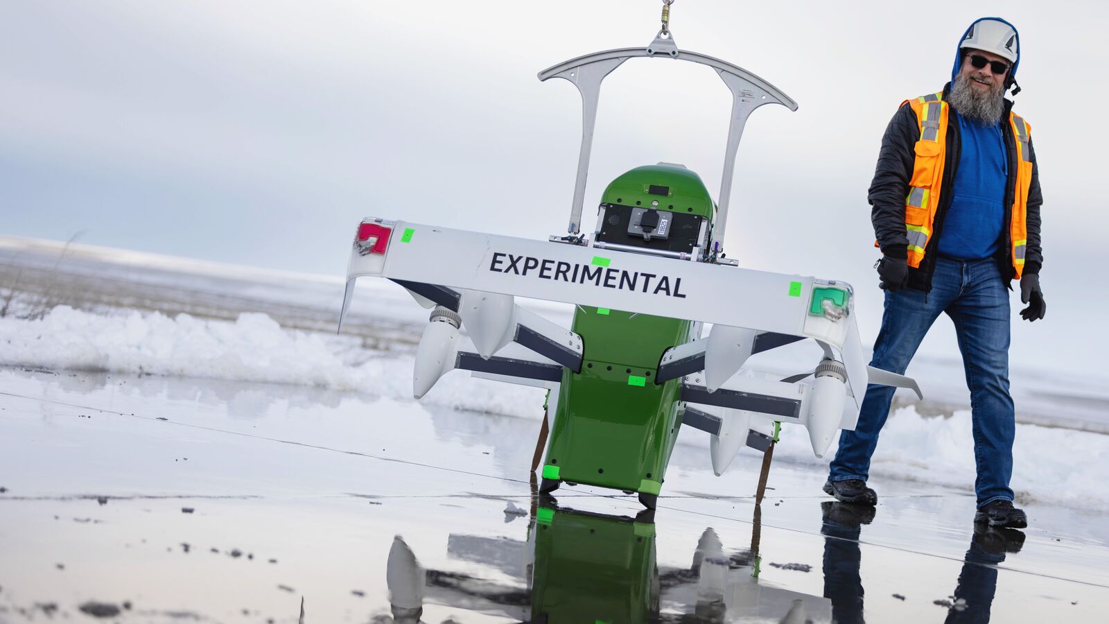 Experimental drone with worker in safety vest