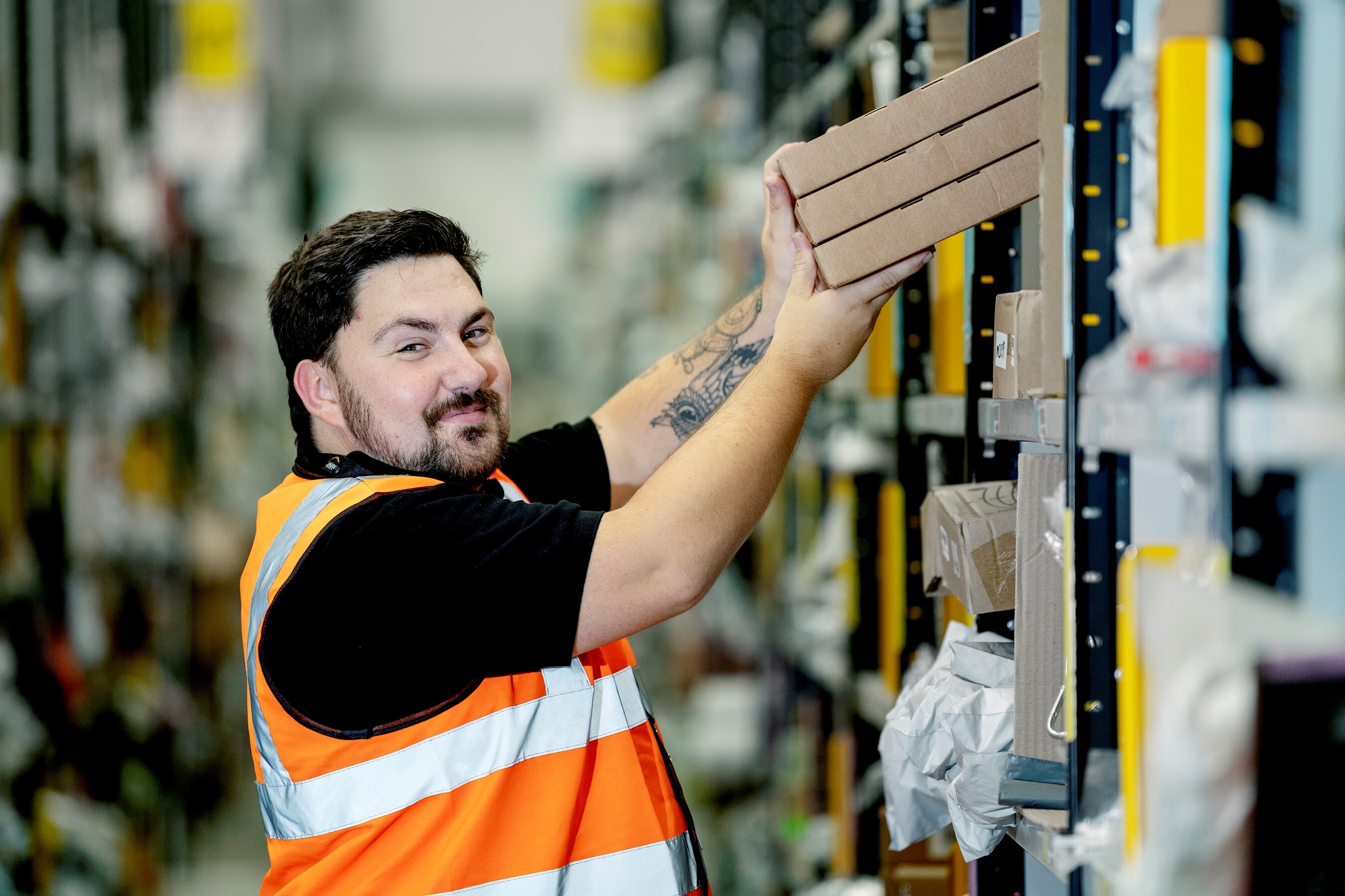 Andrew Kirkby, fulfilment centre employee at Amazon in Doncaster, pictured at work