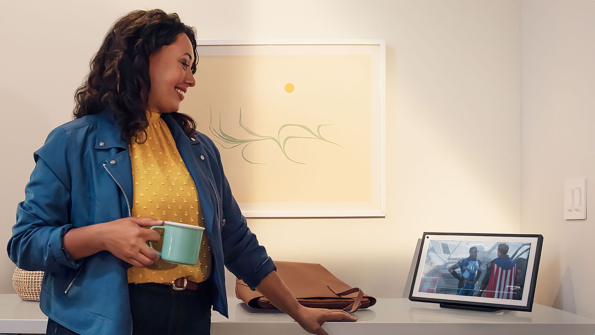 A woman looking at her Echo Show