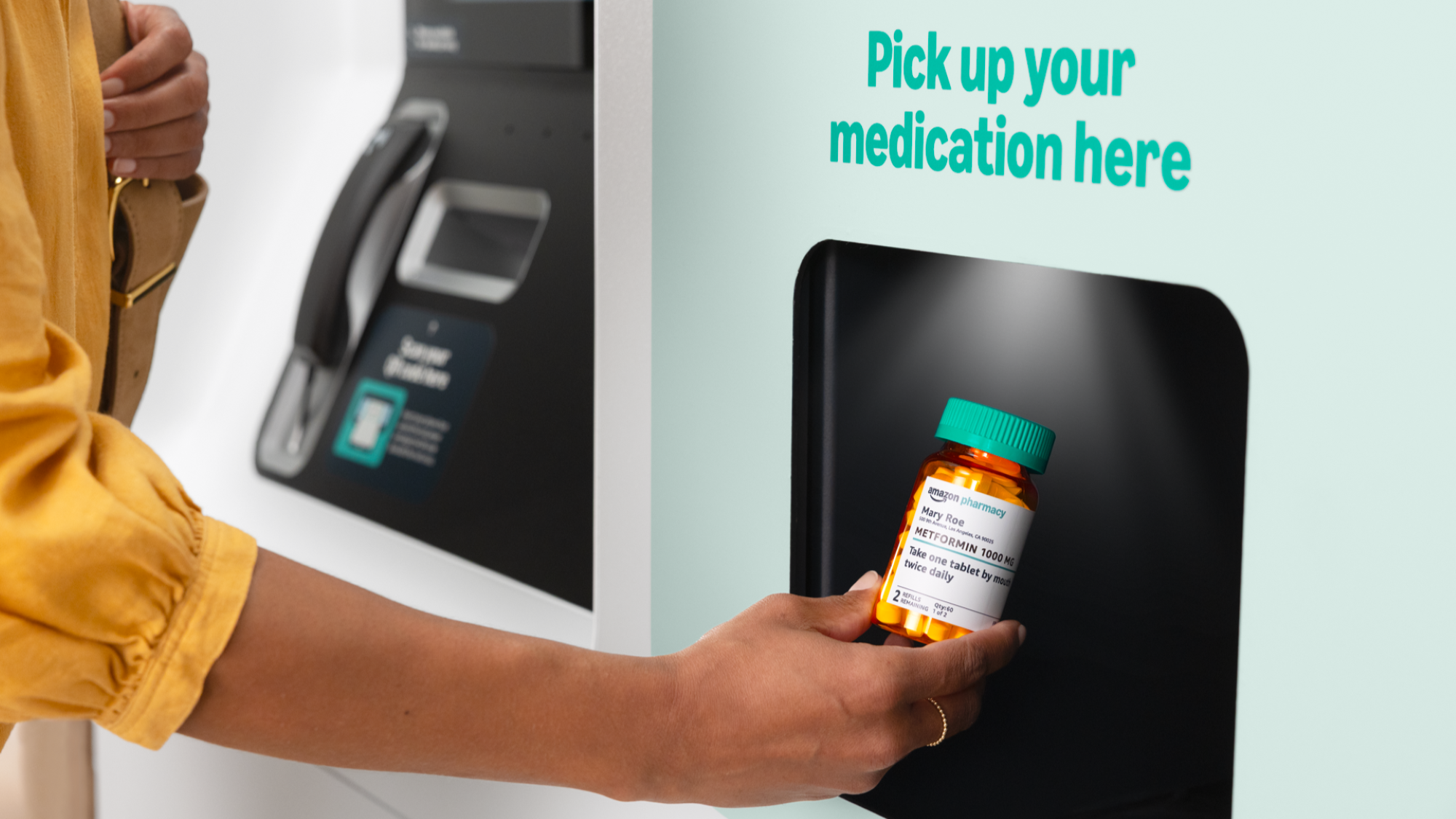 Hand holding prescription bottle from self-service pharmacy kiosk