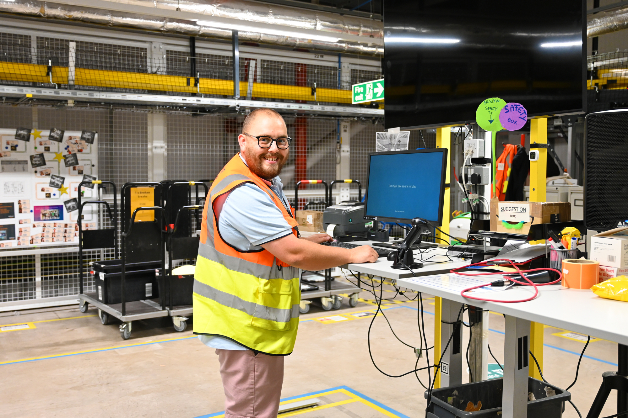 Peter Keay - Area Manager at BRS1 standing at his desk