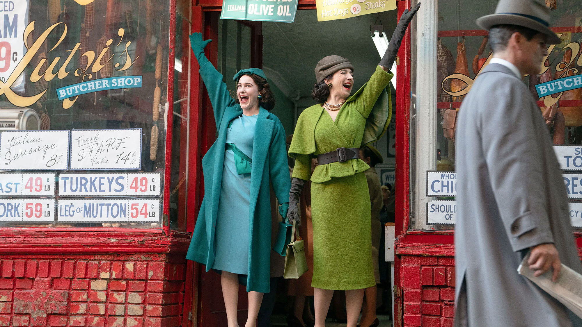 An image of Midge and her mother standing in the entryway of Lutzi's meat shop in "The Marvelous Mrs. Maisel."