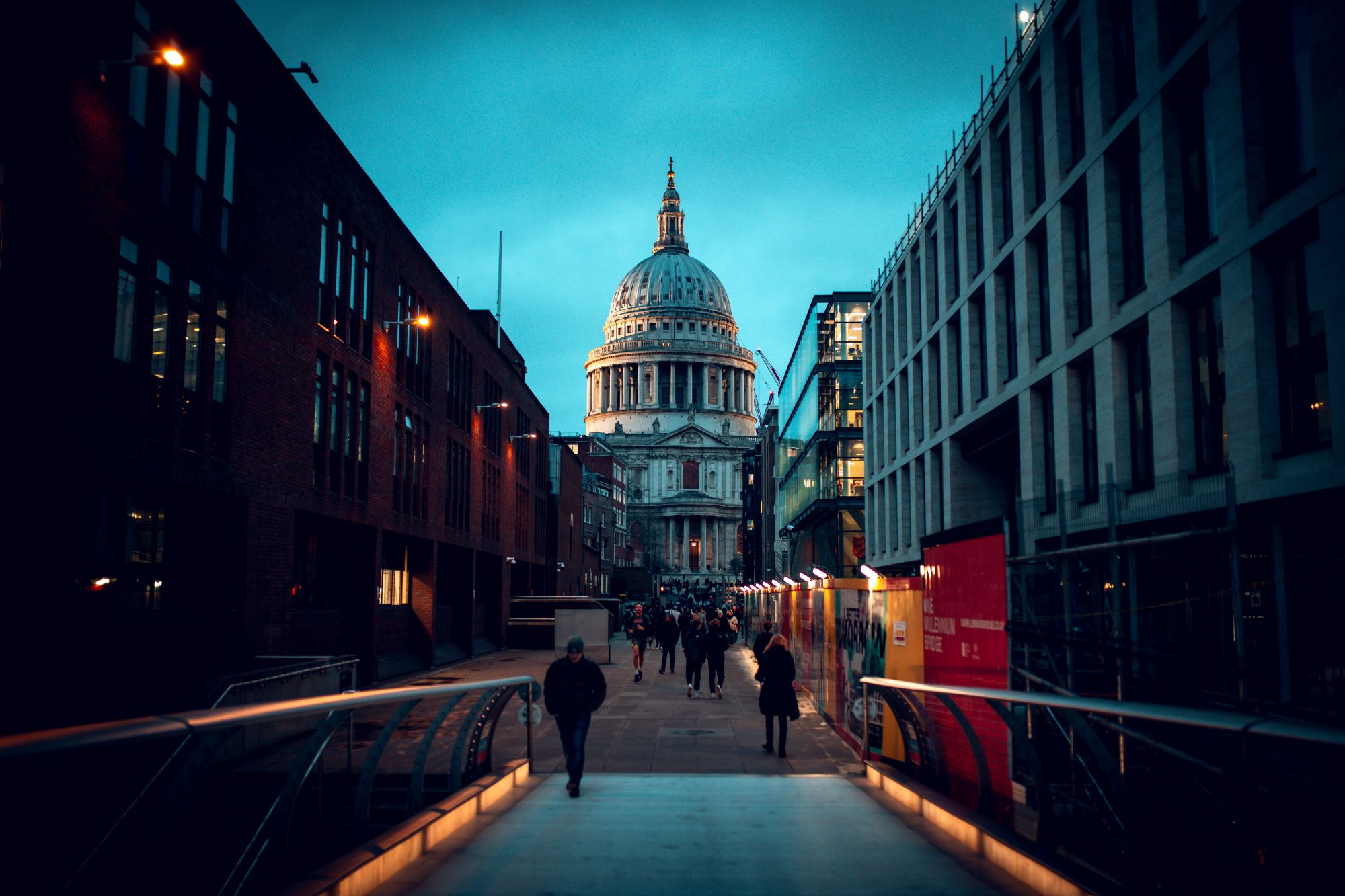 People walking down a street in London
