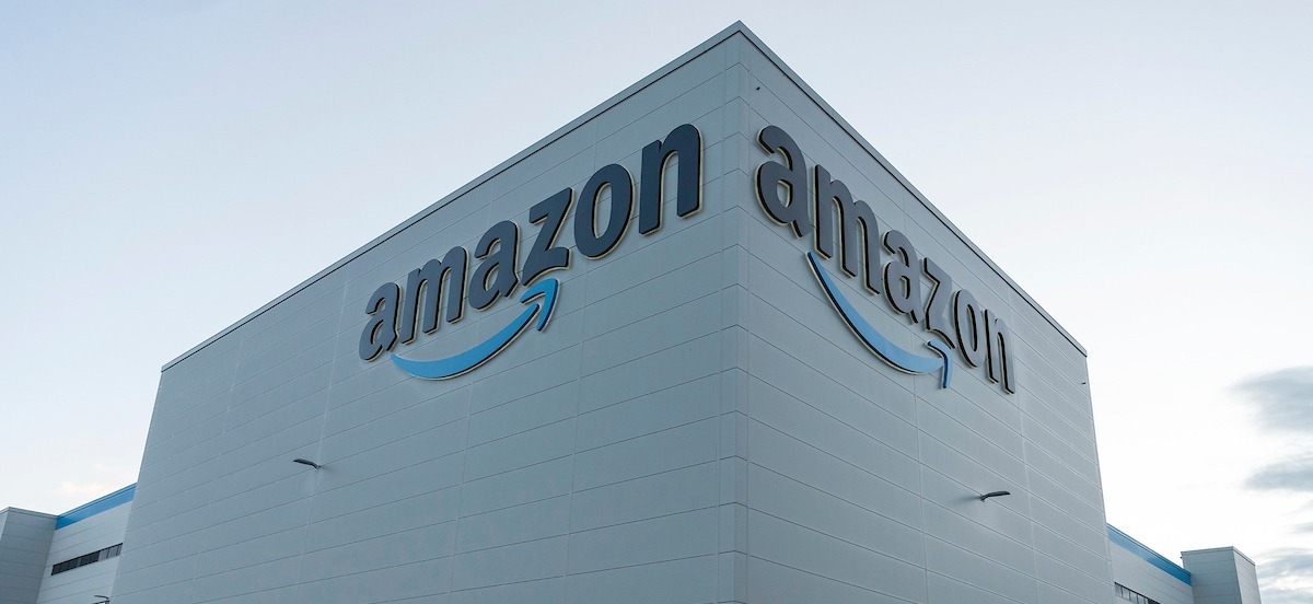 Amazon logo on the front and side of a Fulfilment centre