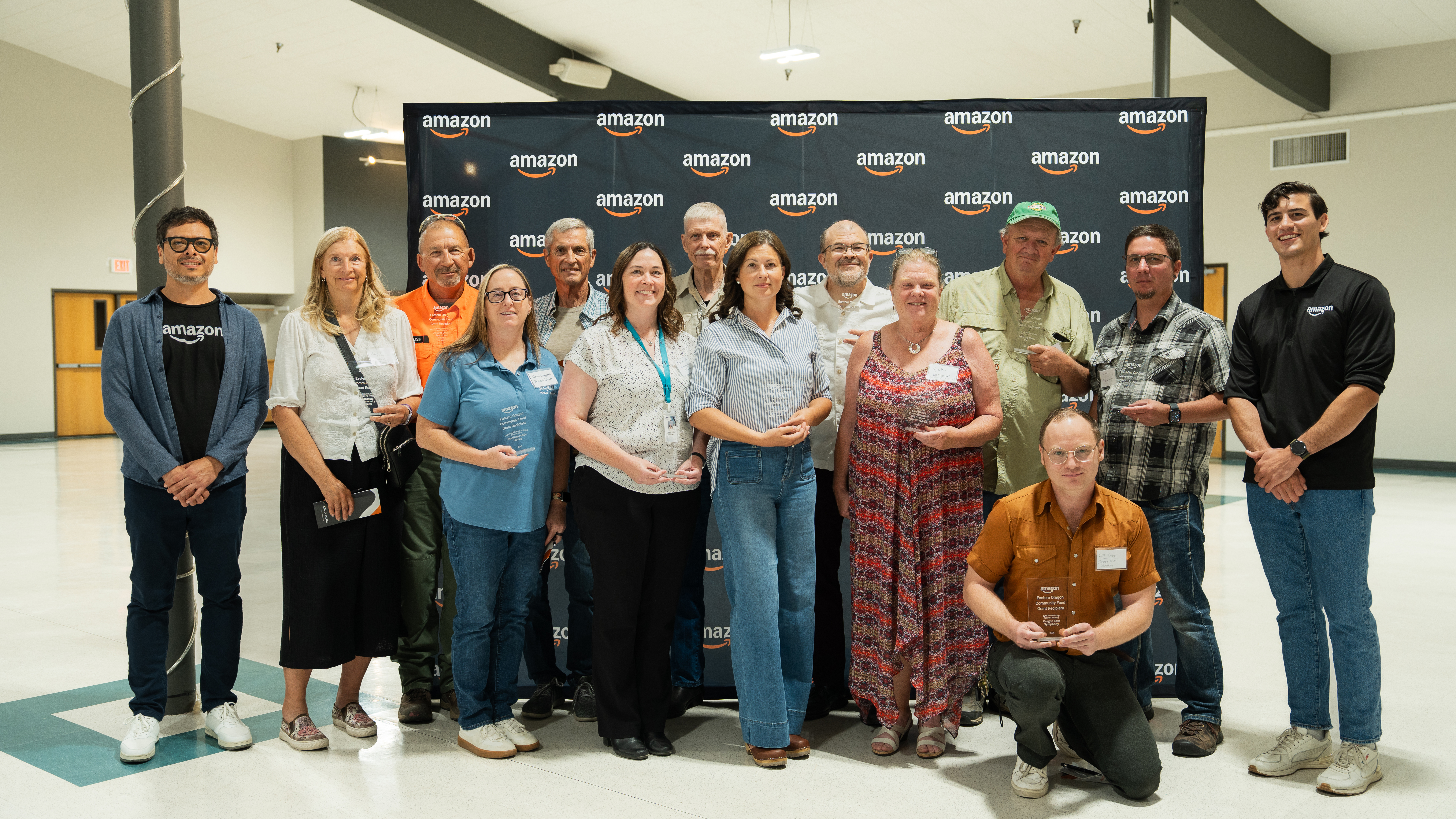 recipients of an award sponsored by amazon in the community aws