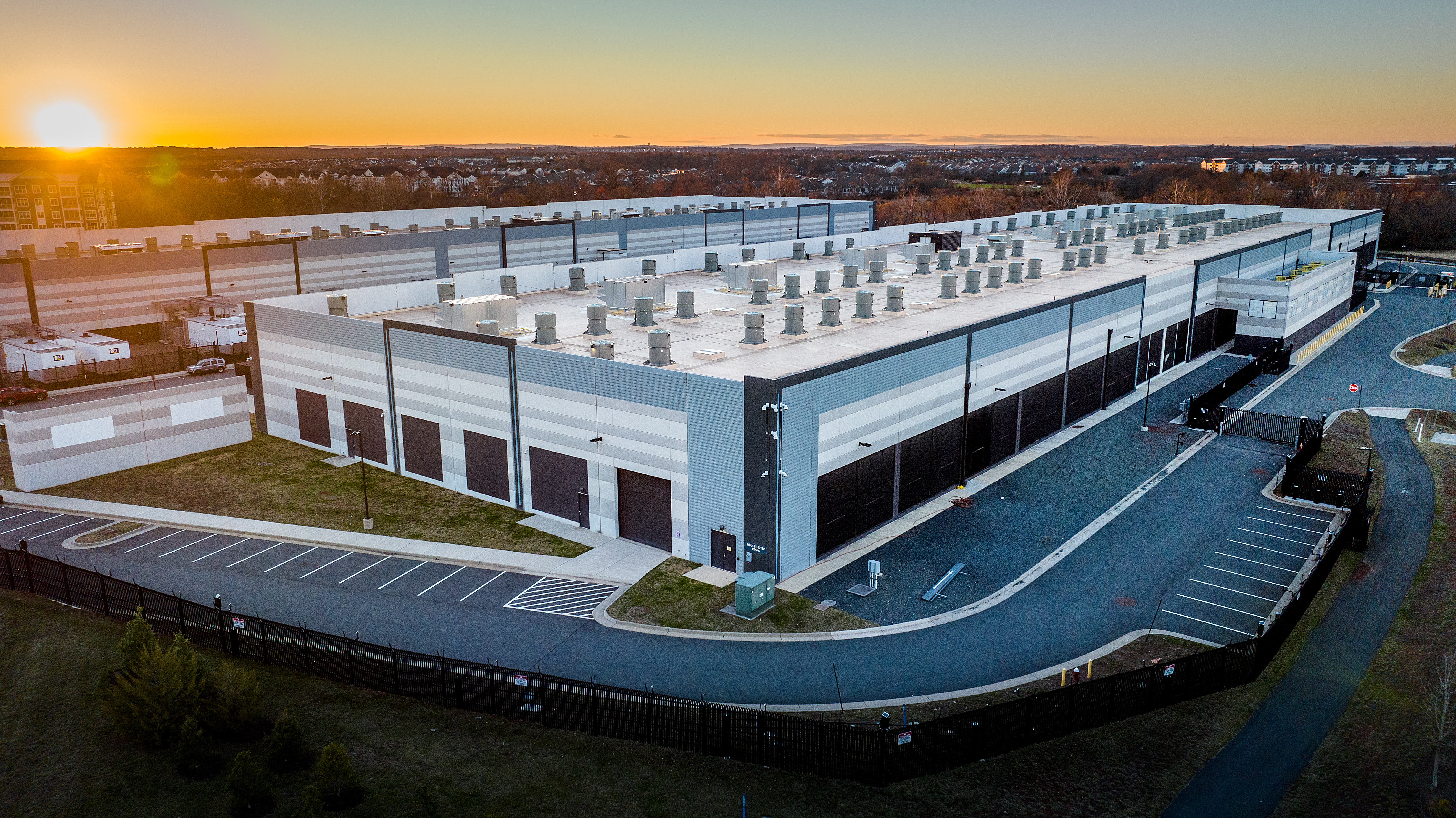 AWS data center with sunset in the background