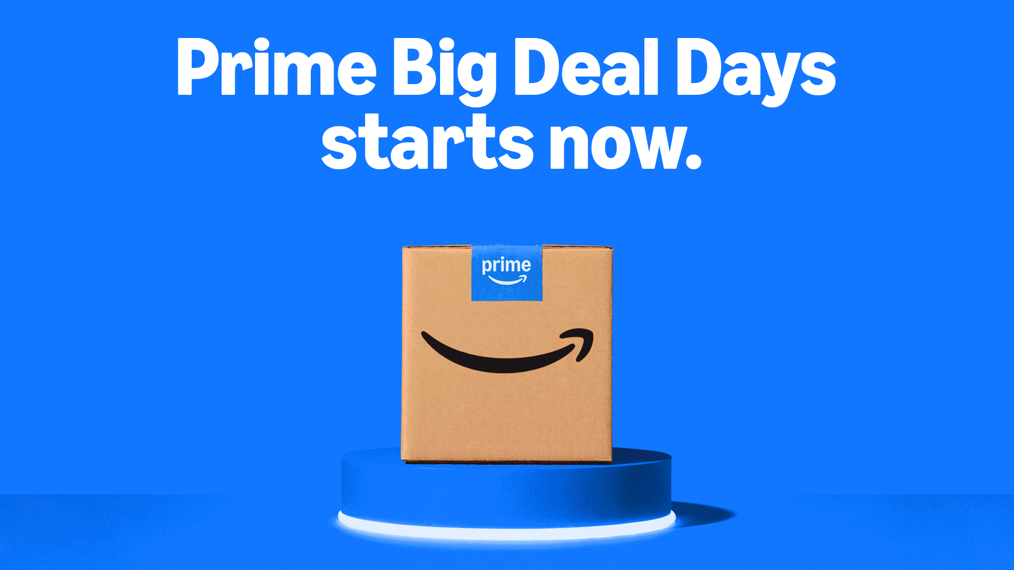 Amazon Prime Big Deal Days promotional gif with cardboard box and products on illuminated blue platform