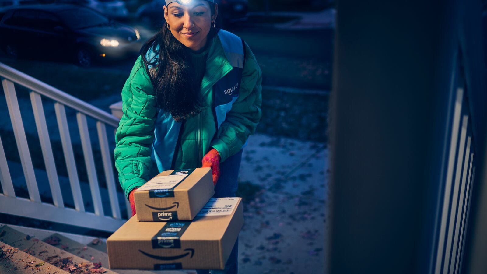 Amazon delivery driver delivers a package to a customer.