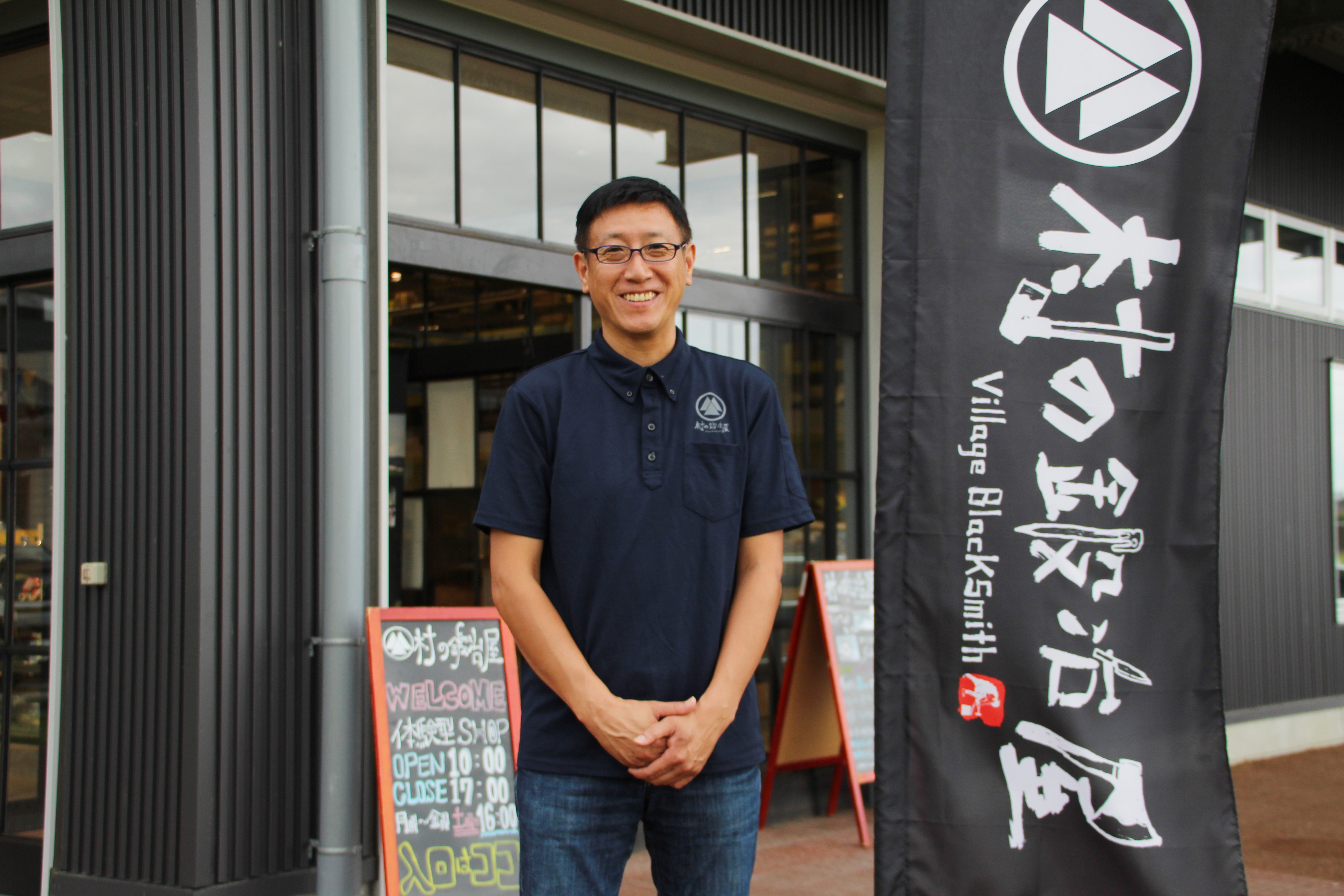 Man outside of resturaunt