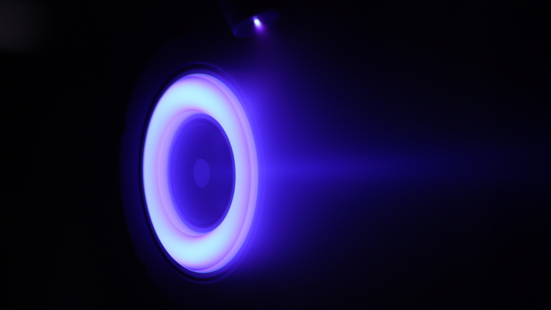 Test firing of the Kuiper hall-effect thruster used aboard Kuiper prototype satellites.