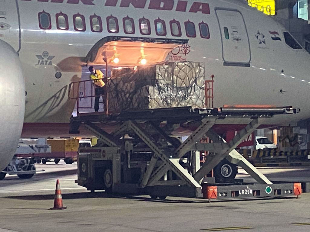 An image showing freight being loaded into an airplane. The product is ventilators being sent to India to support hospitals and organizations during a resurgence of the COVID-19 pandemic. 