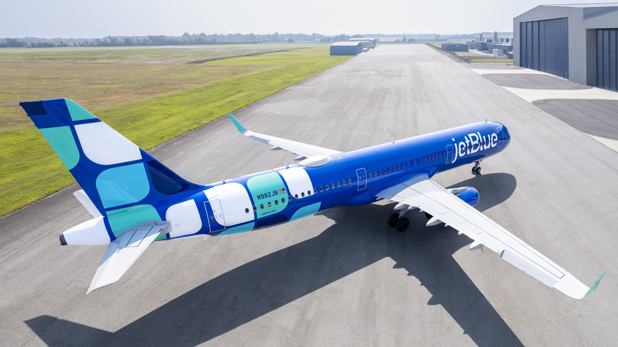 Commercial airliner with JetBlue branding on tarmac