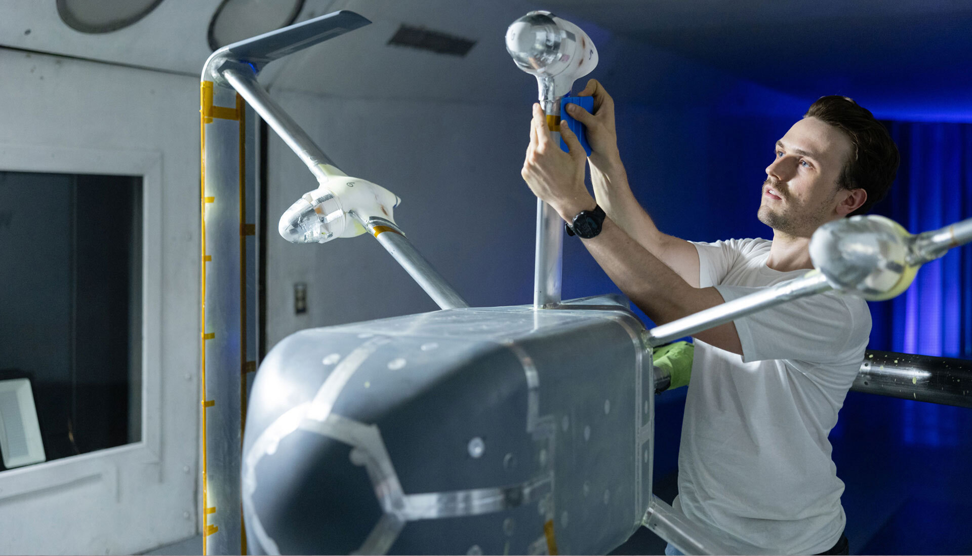 A man working on an Amazon drone.