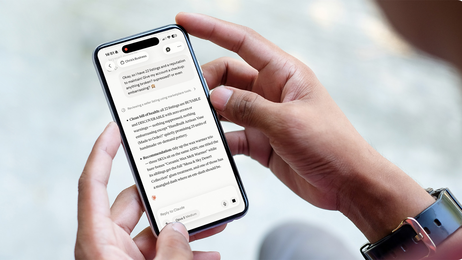 Hands holding a phone showing an AI chat reviewing marketplace listings for issues