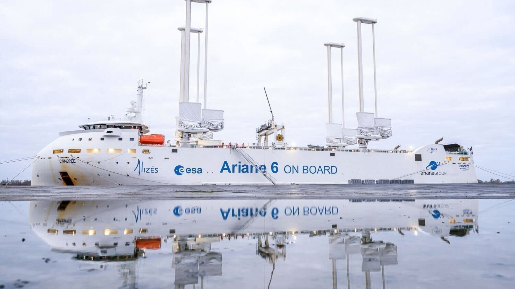Cargo ship Canopée with Ariane 6 rocket components reflected in water
