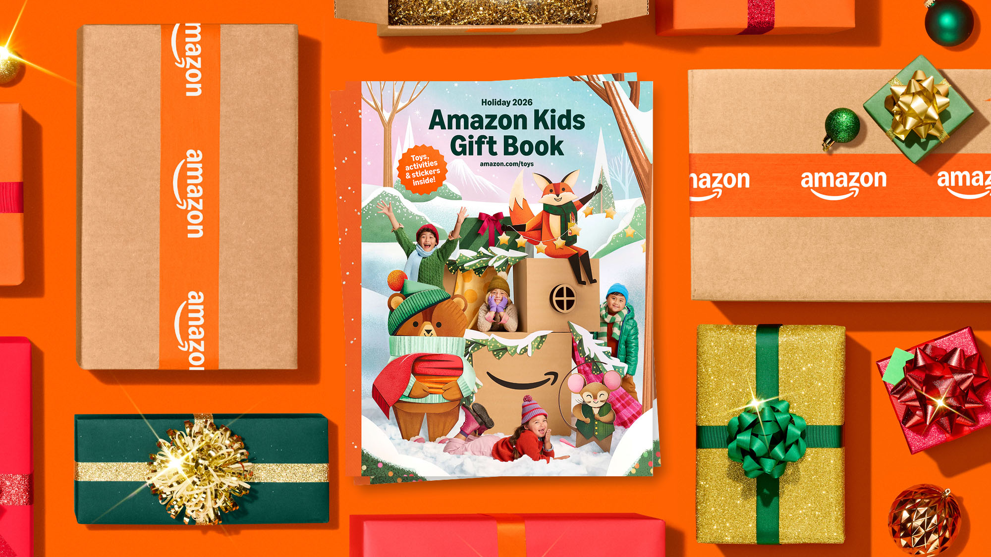 Amazon Kids Gift Book displayed among wrapped holiday presents on an orange background