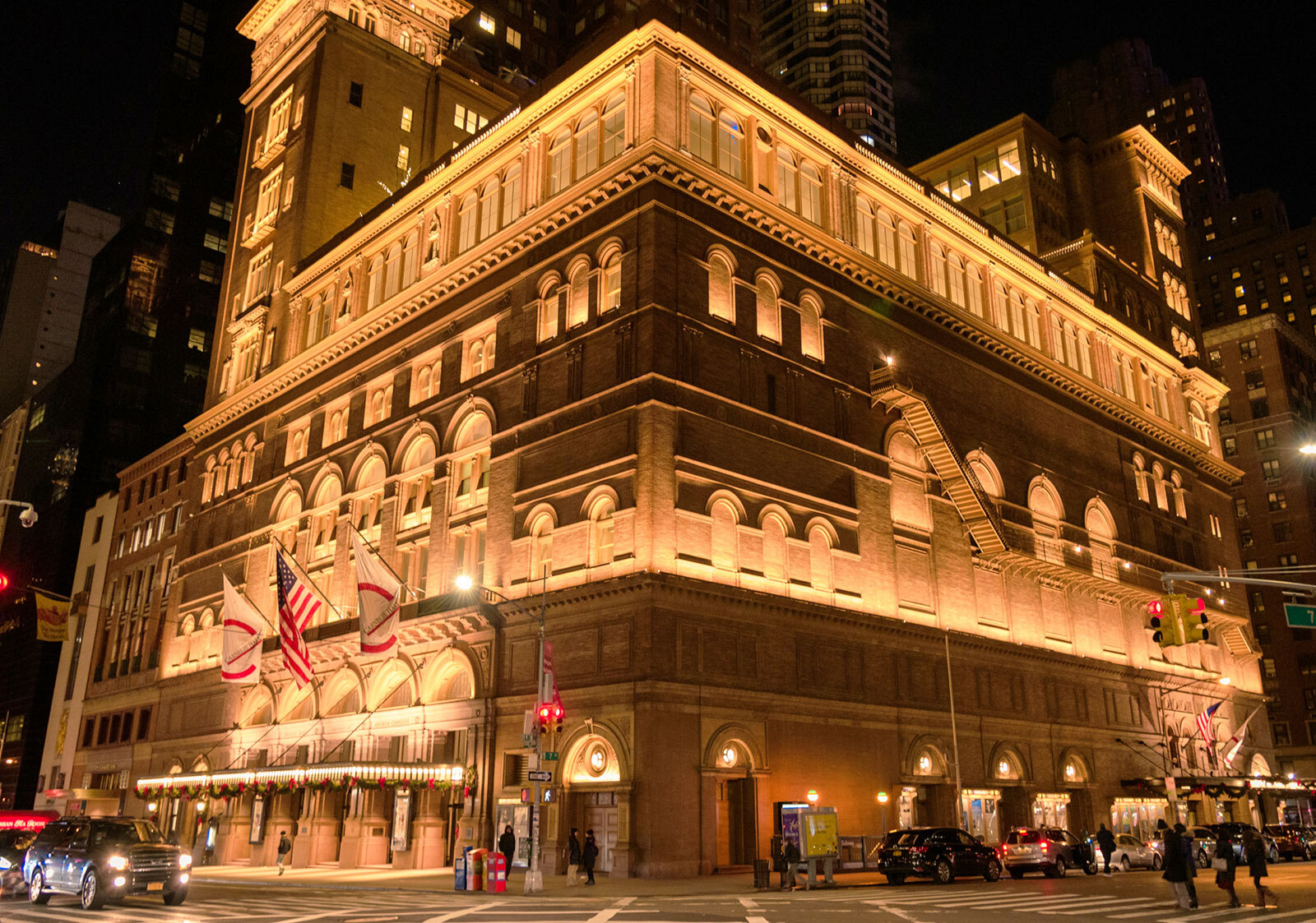 An image of the outside of Carnegie Hall at night