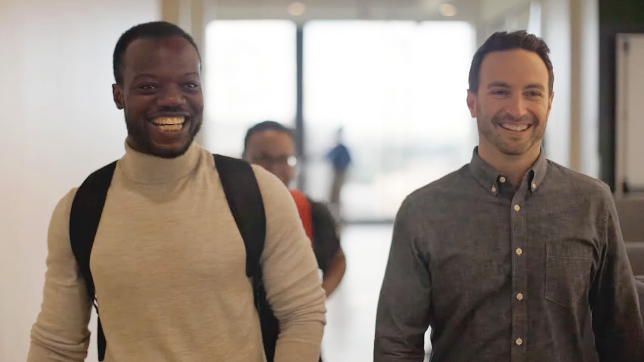 An image of Amazon employees who are part of the AWS Intelligence Initiative Program.