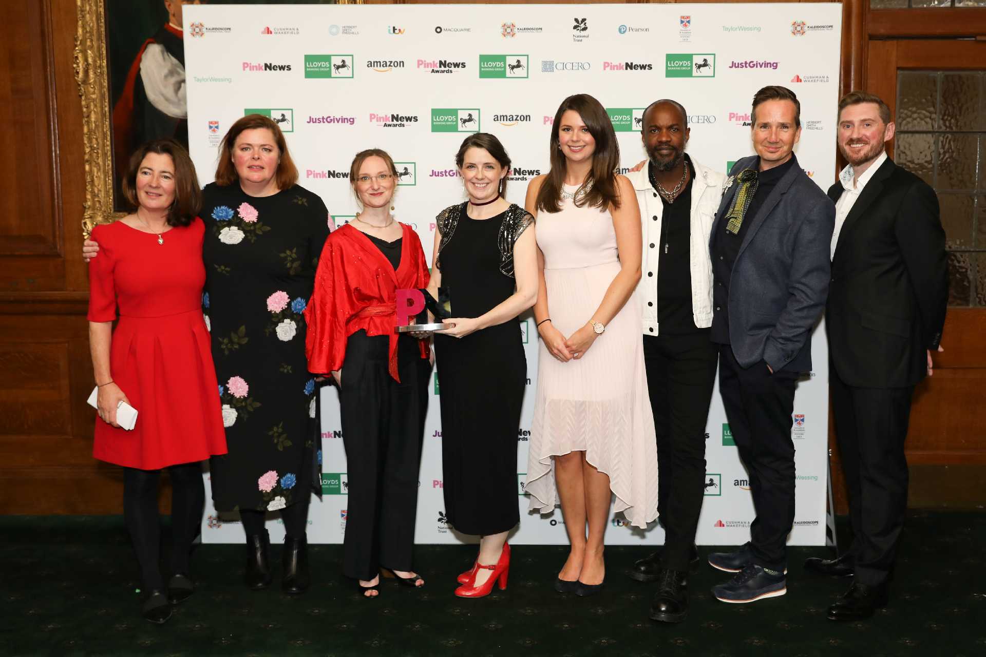 Pink News Award winners stood together for a photo - National Trust