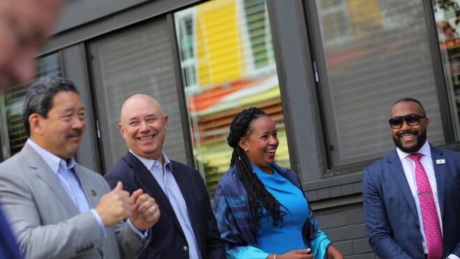 Leaders speak at Mount Baker Village, site of new affordable housing being built with support from Amazon's Housing Equity Fund