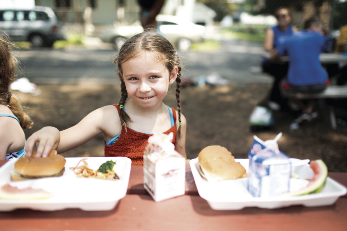 No Kid Hungry - kids in a school setting eating