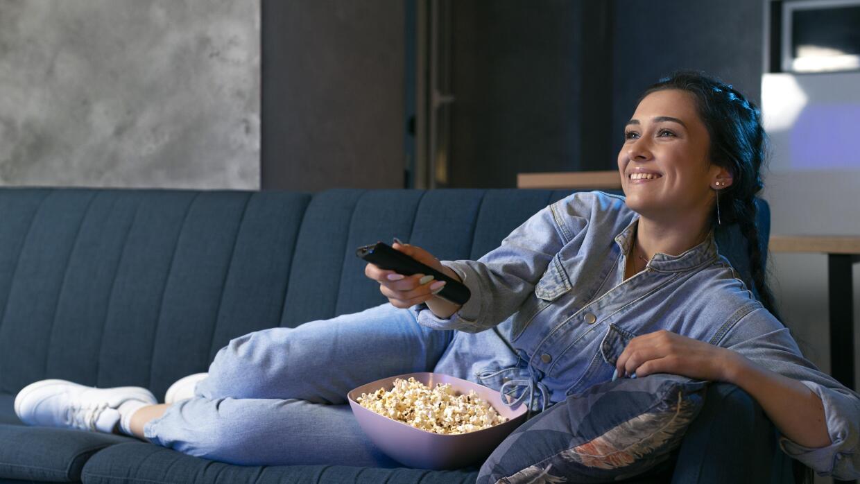 young-woman-watching-streaming-service-home