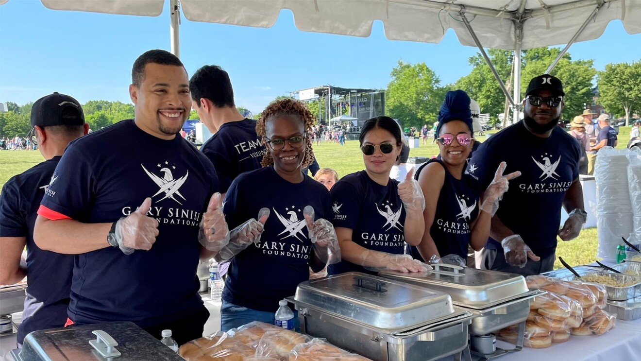 Amazon veterans and military spouses volunteer at the Invincible Spirit Festival on Fort Belvoir in northern Virginia.
