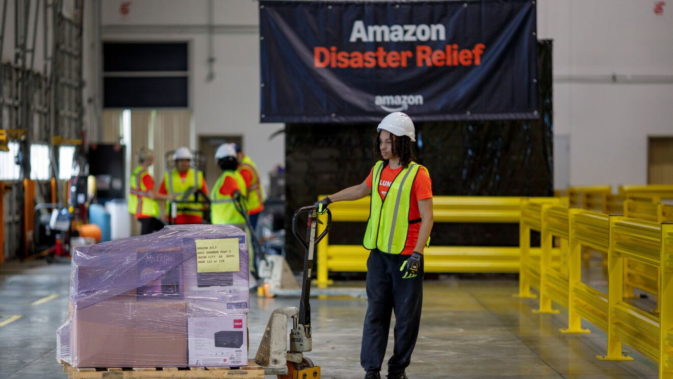 Amazon employees prepare supplies at a Disaster Relief hub