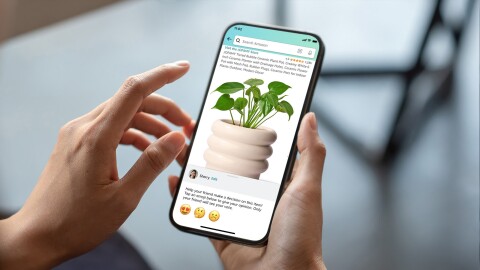 Image of hands holding an iPhone with Consult-A-Friend feature open on Amazon.com.