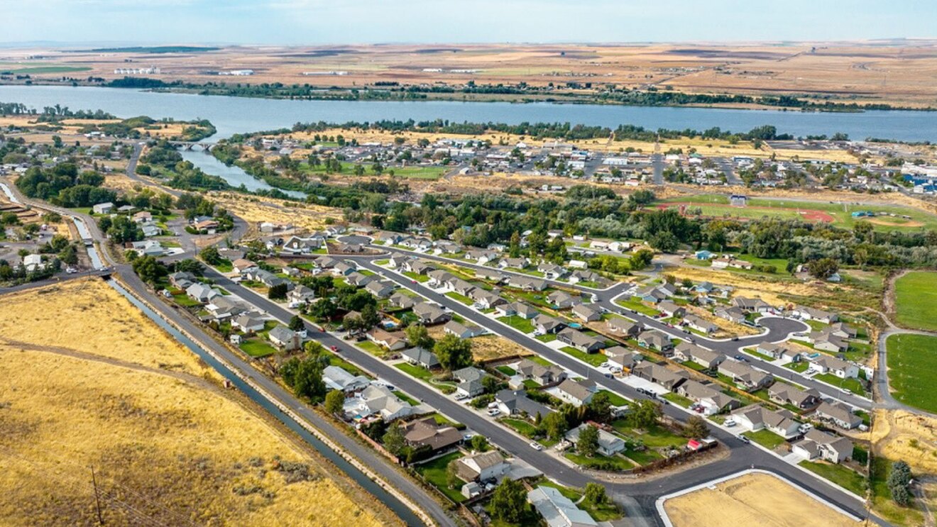 A photo of an irrigation canal that runs through Umatilla, Oregon, delivering spent data center cooling water to AWS data farms.