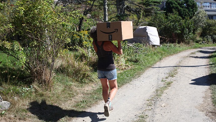 Amazon packages travel by boat, vehicle, and are delivered directly to customers.