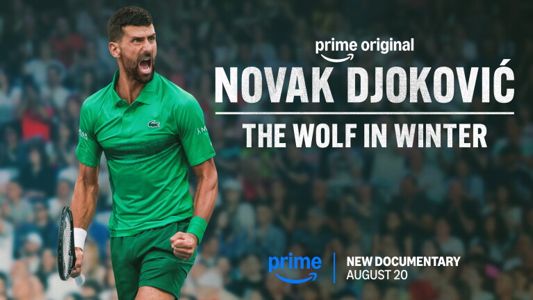 NOVAK DJOKOVIC screams in celebration with a crowd in the background