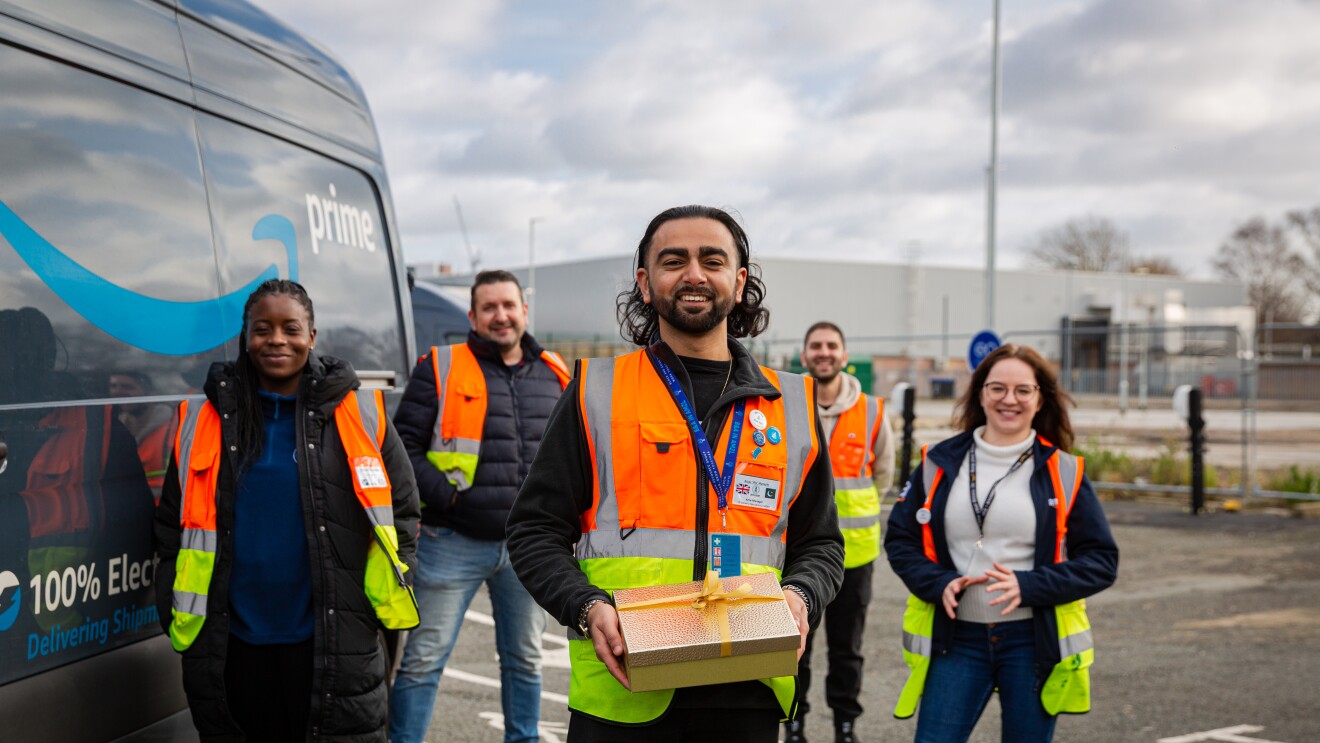 Aizaz with his colleagues at Amazon's Croydon Delivery Station