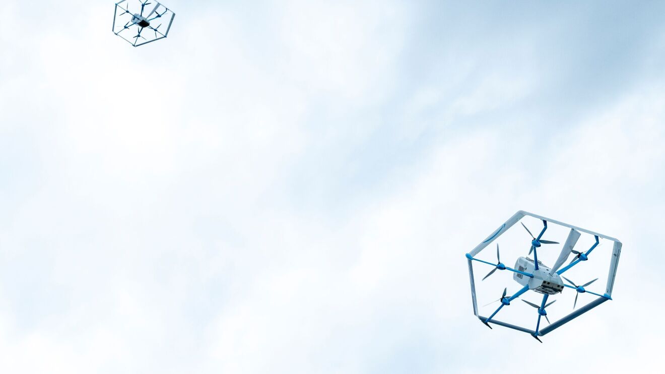 Two drones flying in the air