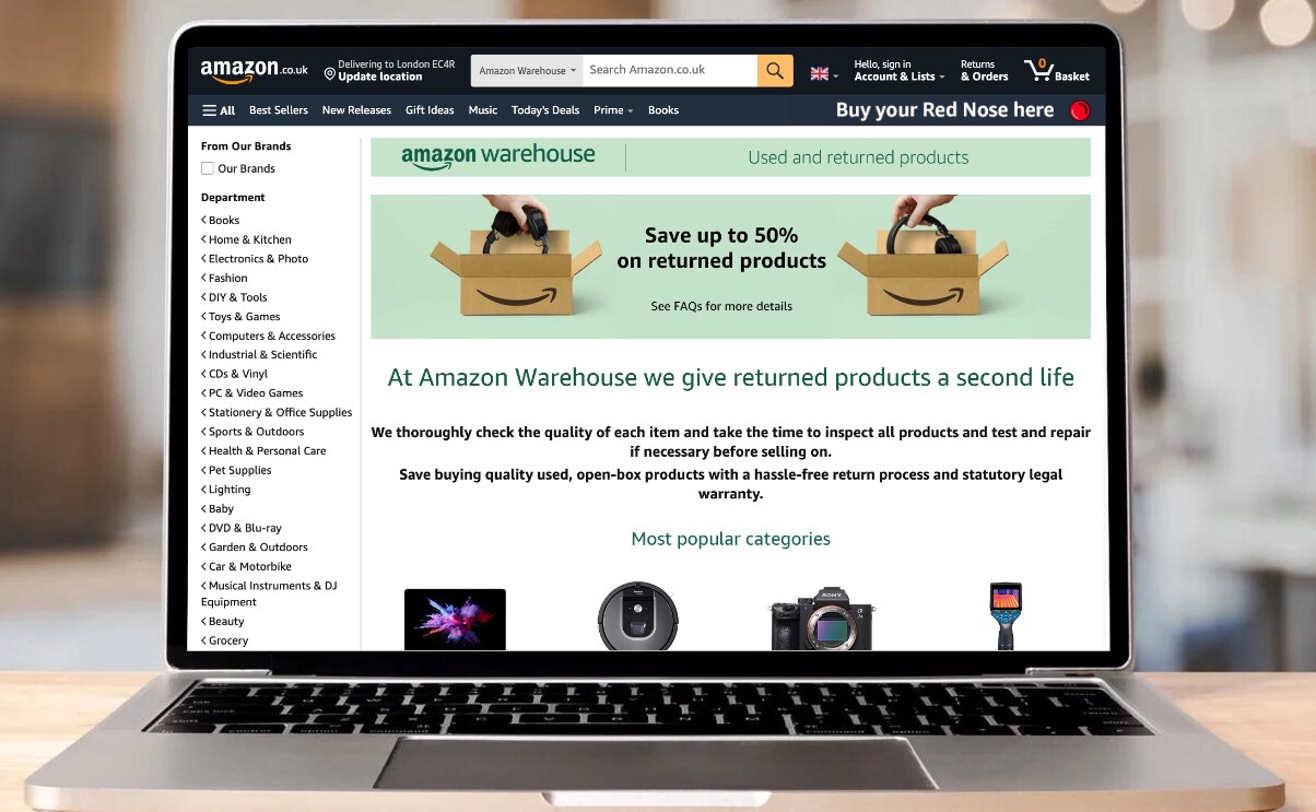 A laptop screen showing the Amazon Warehouse landing page