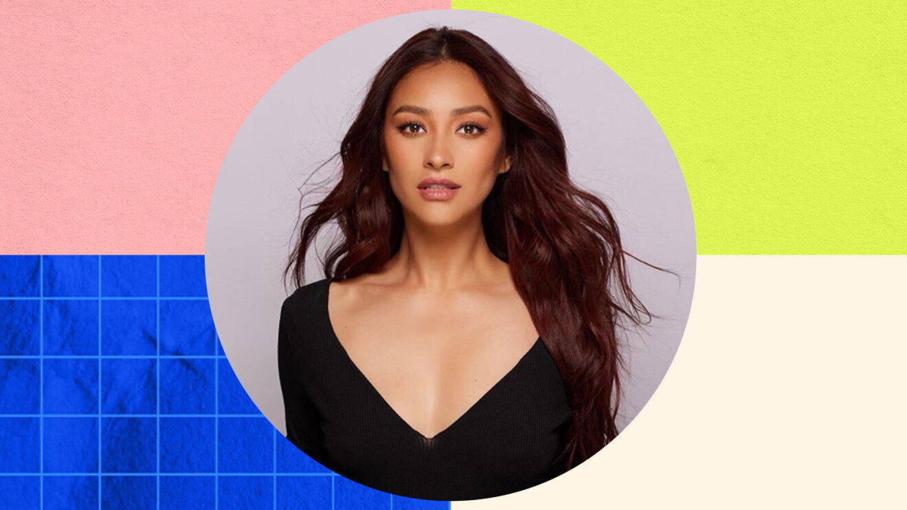 Headshot image of Shay Mitchell on a multi-patterned background.