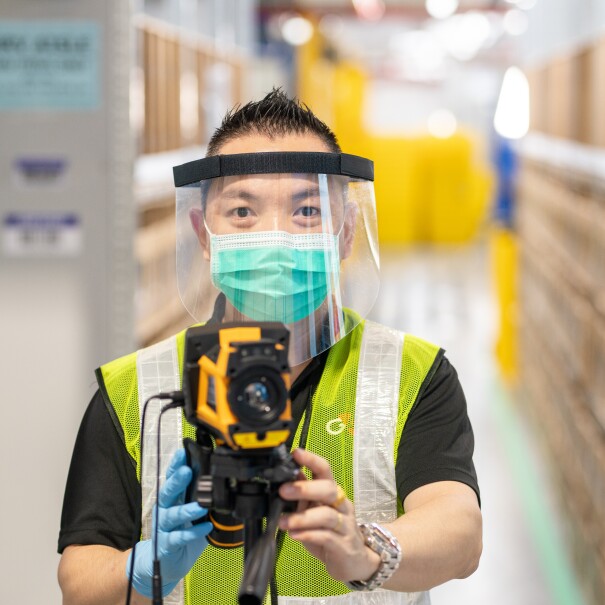 Amazon Singapore employee with safety measure in our fulfillment centre